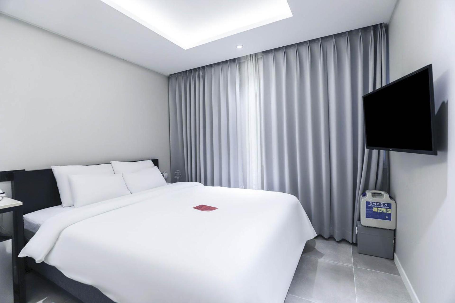 Hotel Hongdan Szongdzsongdong Szoba fotó